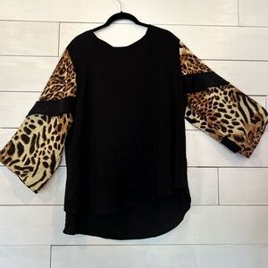 Super cute animal print and black top!